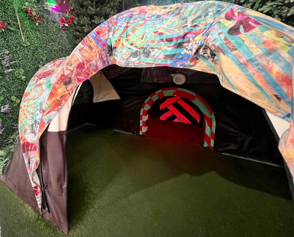 The multi-colored tent with a crawl space inside.