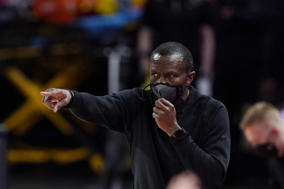 Detroit Pistons head coach Dwane Casey directs from the sideline during the first half of an NBA basketball game against the Chicago Bulls, Sunday, May 9, 2021, in Detroit. (AP Photo/Carlos Osorio)