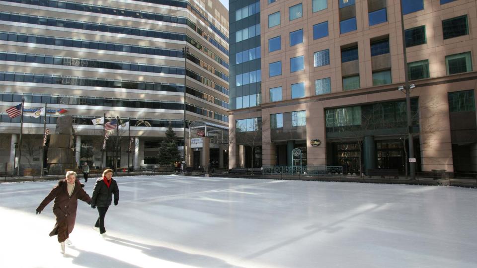 Ice skating at the Rotary Rink, Main Street, downtown.