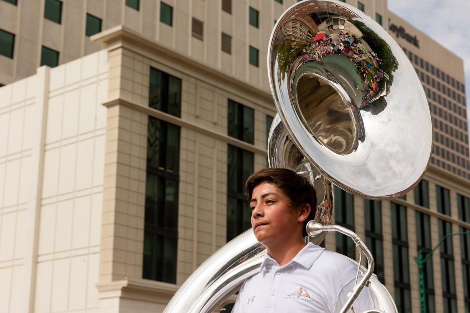 The reflection of the crowd is seen in a member of the Mountain Ridge High School marching band’s tuba during the annual Days of ’47 Parade in Salt Lake City on Monday, July 24, 2023. | Megan Nielsen, Deseret News