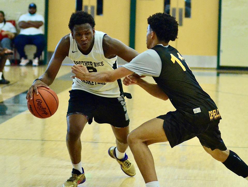 Brother Rice's Curtis Williams dribbles during the Derrick Coleman Elite boys basketball showcase on Wednesday, June 15, 2022, at Birmingham Groves.