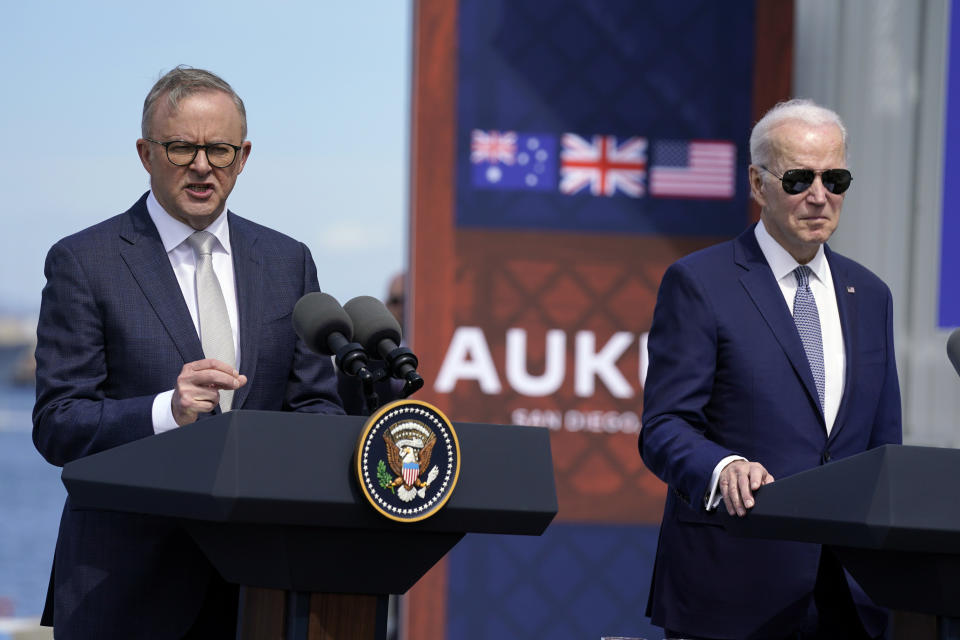 Australian Prime Minister Anthony Albanese speaks as President Joe Biden listens during a news conference with British Prime Minister Rishi Sunak, at Naval Base Point Loma, Monday, March 13, 2023, in San Diego, as they unveil, AUKUS, a trilateral security pact between Australia, Britain, and the United States. (AP Photo/Evan Vucci)