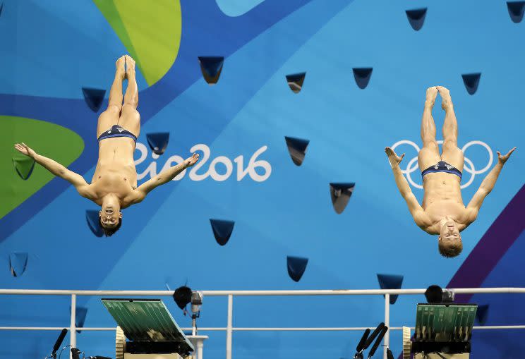 Britain's Jack Laugher and Chris Mears compete during the men's synchronized 3-meter springboard diving final in the Maria Lenk Aquatic Center at the 2016 Summer Olympics in Rio de Janeiro, Brazil, Wednesday, Aug. 10, 2016. (AP Photo/Wong Maye-E)