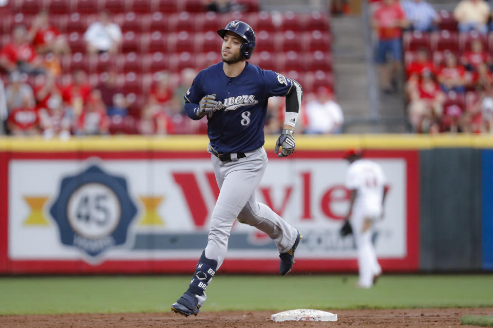 FILE - In this Sept. 24, 2019, file photo, Milwaukee Brewers' Ryan Braun runs the bases after hitting a solo home run during the second inning of the team's baseball game against the Cincinnati Reds in Cincinnati. The Brewers have declined to exercise a $15 million mutual 2021 option on Braun as the franchise’s career home run leader ponders whether to continue playing. Braun is due a $4 million buyout. The 37-year-old often said this year that this might be his final season. He has spent his entire career in Milwaukee and has a franchise-record 352 career home runs. (AP Photo/John Minchillo, File)