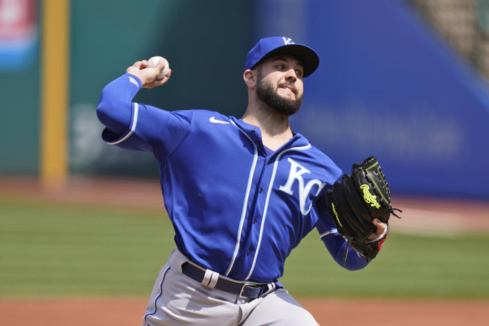 Kansas City Royals starting pitcher Jakob Junis delivers in the first inning of a baseball game against the Cleveland Indians, Wednesday, April 7, 2021, in Cleveland. (AP Photo/Tony Dejak)