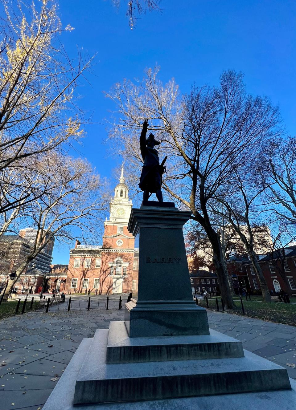 A statue honoring Commodore John Barry as the father of the U.S. Navy on the public grounds behind Independence Hall.