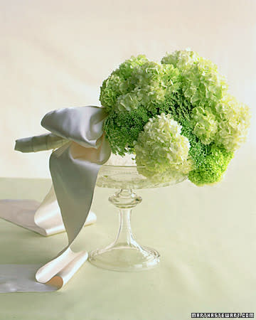 <div class="caption-credit"> Photo by: Dana Gallagher</div><b>Green and White Laced Bouquet</b> <br> <br> From a distance, this bouquet of viburnum and a Queen Anne's lace look-alike appears to be a bunch of soft, puffed snowballs; a close look reveals tiny blooms.