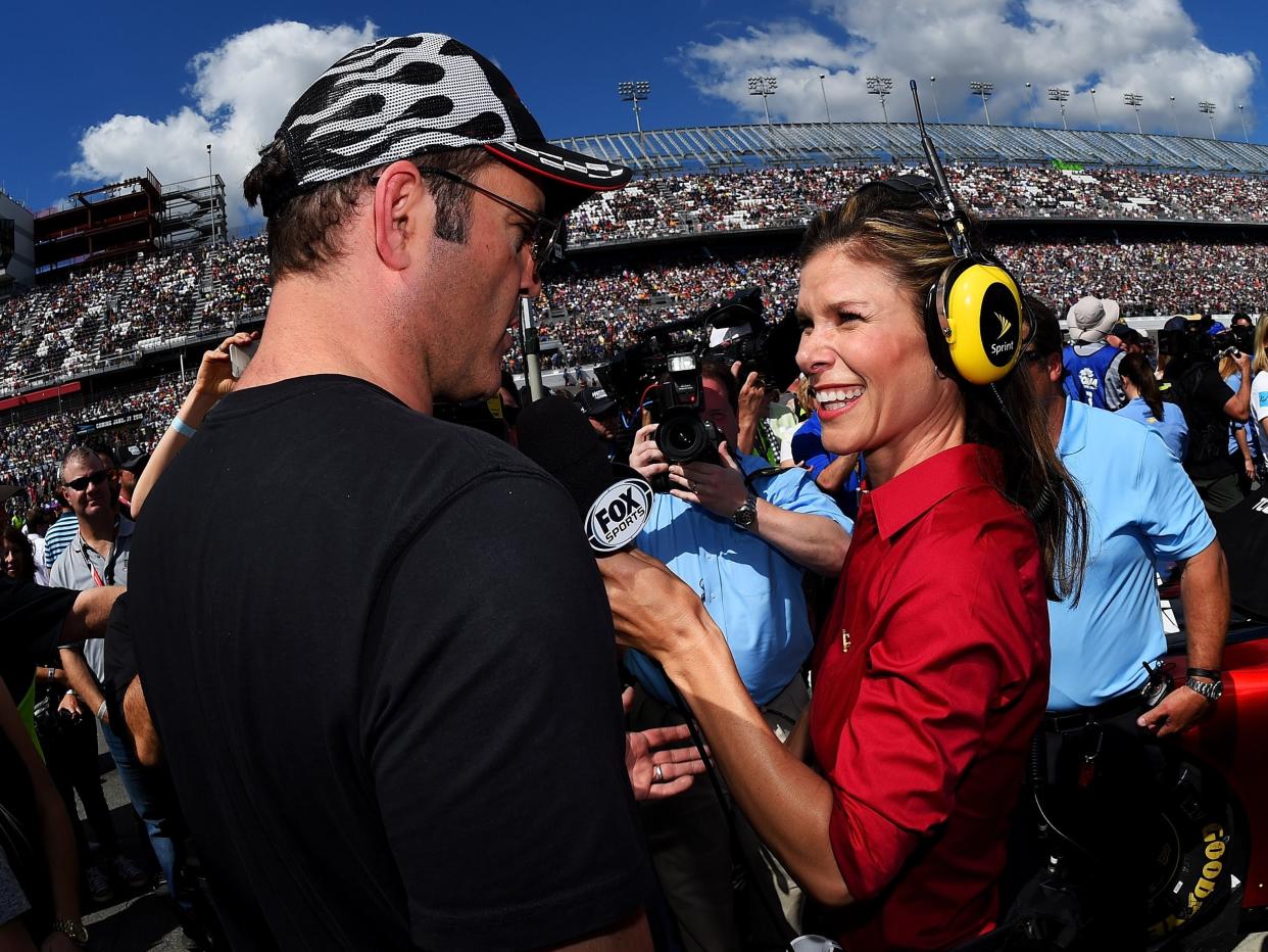 Jamie Little, right, interviews actor Vince Vaughn at the 2015 edition of the Daytona 500 NASCAR race.