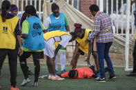 In this Sunday, Oct. 27, 2019 photo, Sudanese al-Tahadi women team practices in Omdurman, Khartoum's twin city, Sudan. The women's soccer league has become a field of contention as Sudan grapples with the transition from three decades of authoritarian rule that espoused a strict interpretation of Islamic Shariah law. (AP Photo)