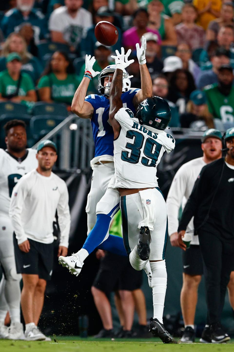 Indianapolis Colts wide receiver Alec Pierce (14) attempts a catch as Philadelphia Eagles cornerback Eli Ricks (39) breaks up the play during the first half an NFL pre-season football game, Thursday, Aug. 24, 2023, in Philadelphia.