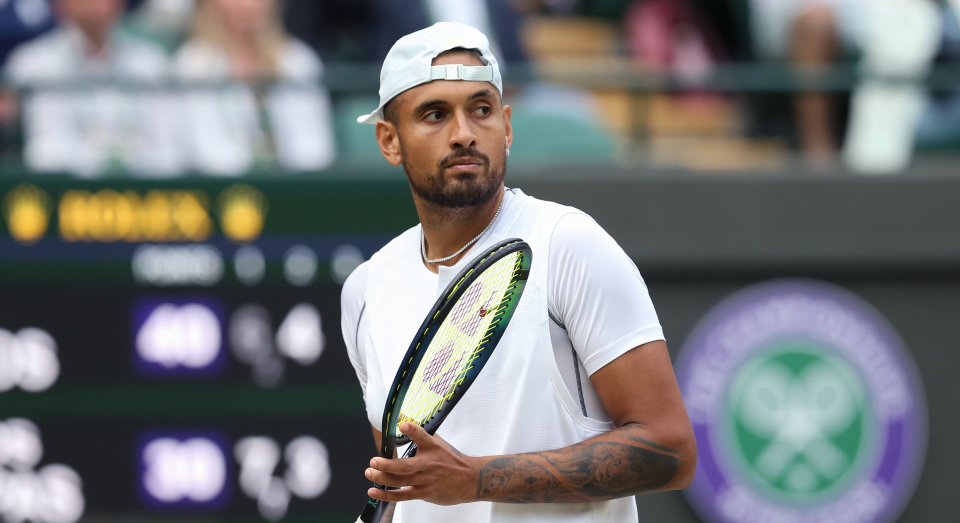 Nick Kyrgios of Australia in action during his Gentlemens Singles Third Round match against Stefanos Tsitsipas of Greece during day six of The Championships Wimbledon 2022 at All England Lawn Tennis and Croquet Club on July 2, 2022 in London, England