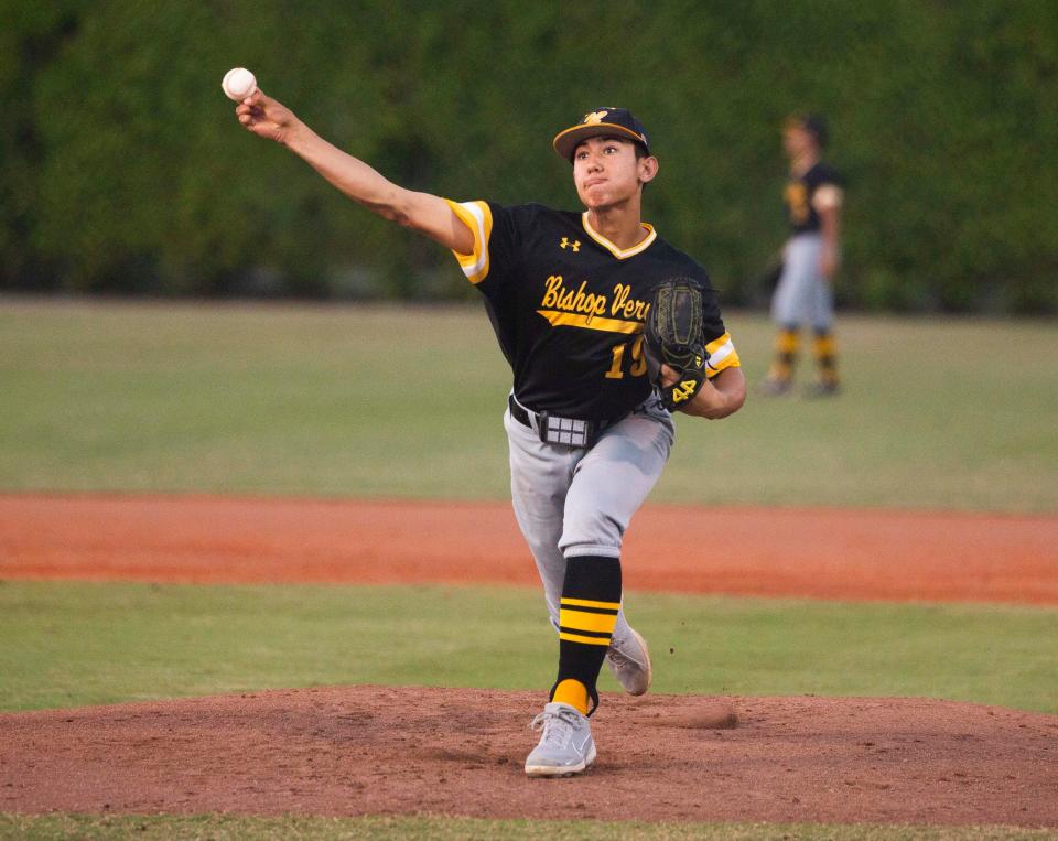Bishop Verot's Aidan Knaak (19) pitches during the Bishop Verot and Community School of Naples baseball game on Thursday, Feb. 24, 2022 at Barron Collier High School in Naples, Fla. 