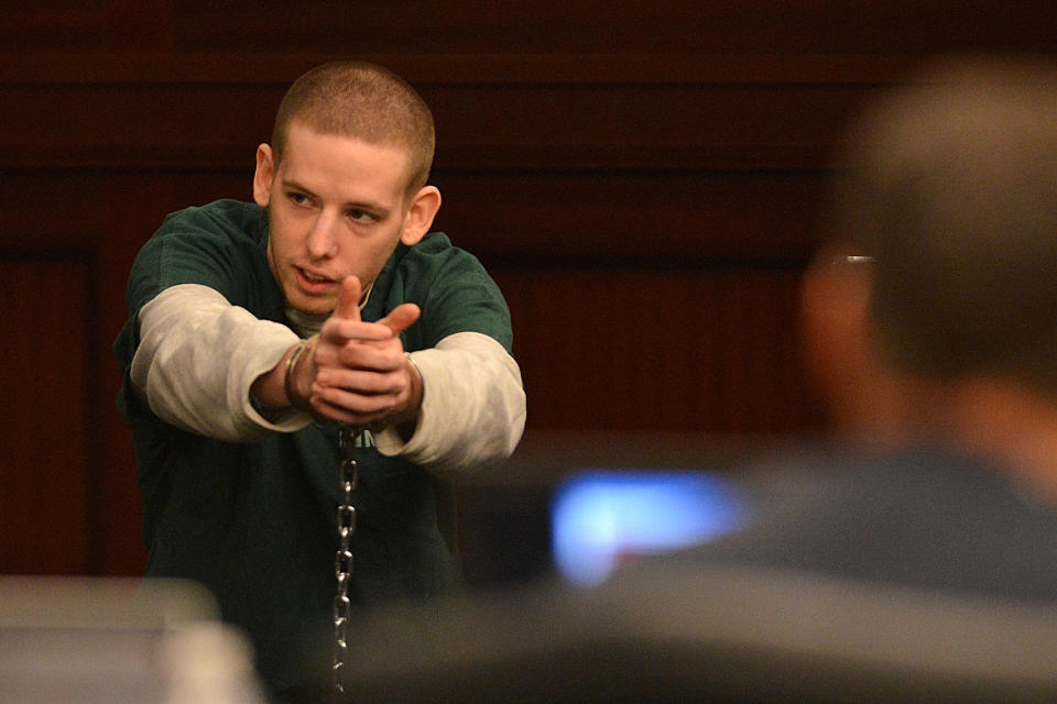 Shawn Atkins, currently in prison on theft charges, testifies in the trial of Michael Dunn in Jacksonville, Fla., Thursday, Feb. 6, 2014. Atkins provided an eye witness account and the license tag of Dunn's car to police. Dunn is accused in the shooting death of Jordan Davis, who was outside a store with friends in November 2012. (AP Photo/Bob Mack, Pool)