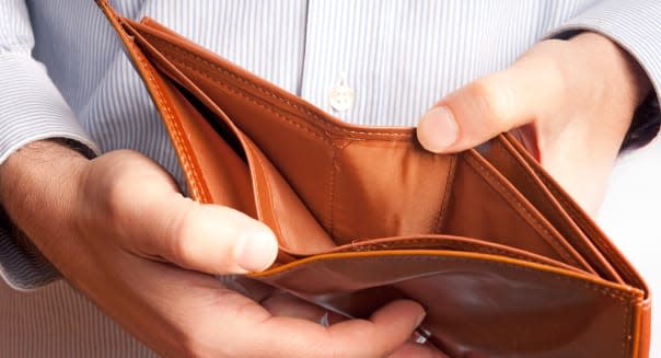 man showing an empty wallet