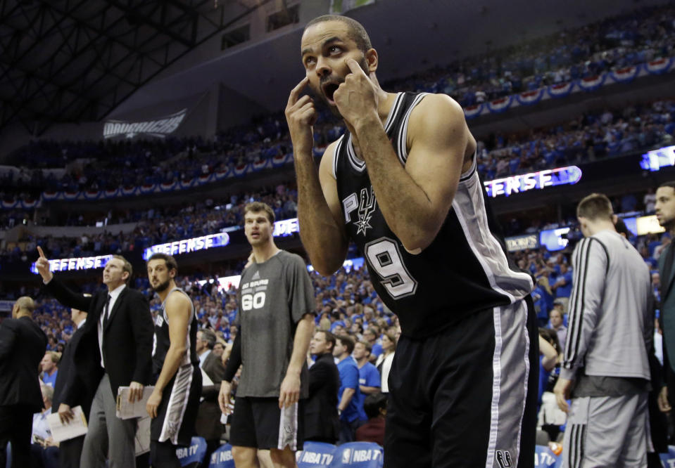 San Antonio Spurs' Tony Parker (9), of France, pleads with an official to look at an inbound play on instant replay in the final seconds of the second half of Game 6 of an NBA basketball first-round playoff series against the Dallas Mavericks, Friday, May 2, 2014, in Dallas. The Mavericks won 113-111. (AP Photo/Tony Gutierrez)