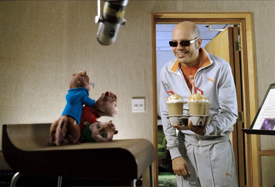 David Cross offers an iced coffee drink to CGI chipmunks