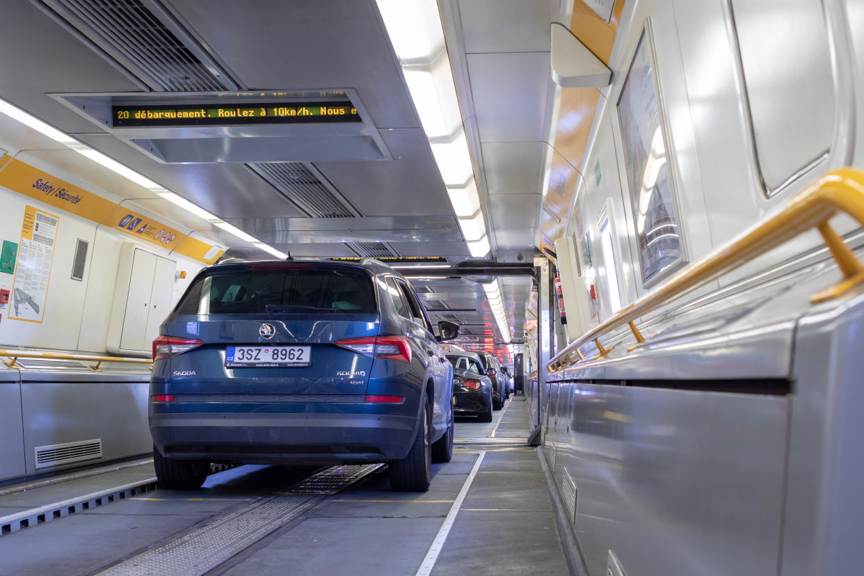 Eurotunnel train, France, UK - July 19, 2018: Blue car on board of Eurotunnel train connecting the UK and France. A journey to cross the English channel takes only 35 minutes.