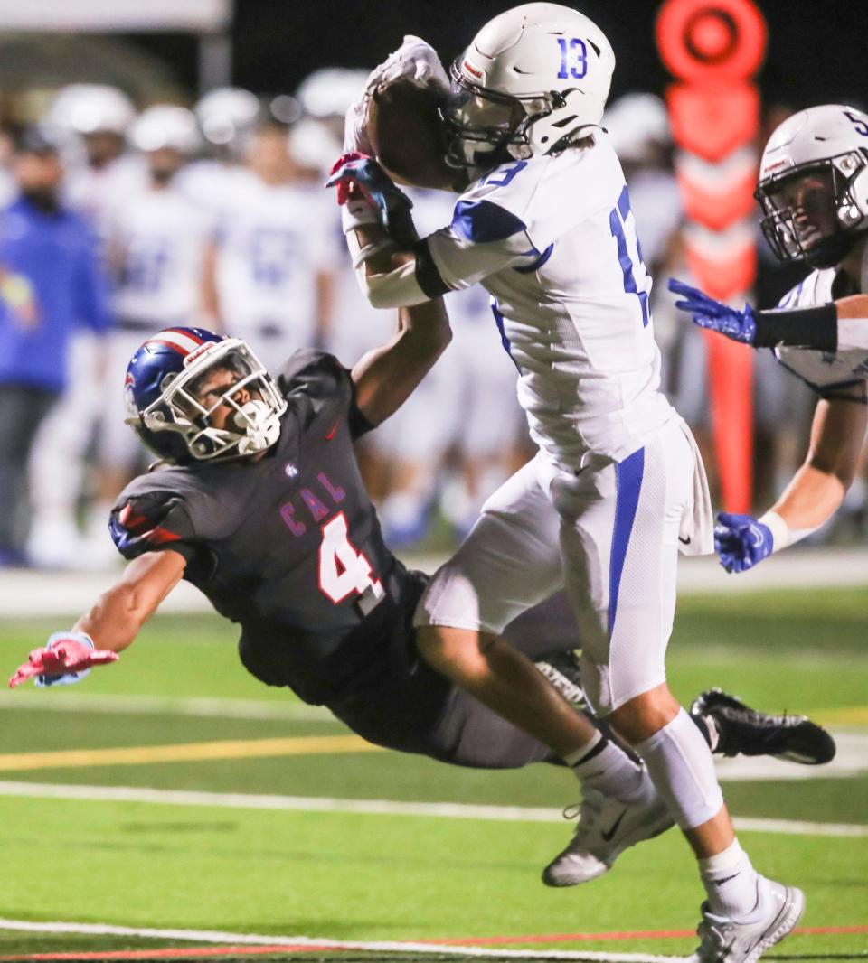 Lexington Christian's Jackson Dillow snatches the pass intended for CAL's Justin Ruffin late in the fourth quarter that could have put Christian Academy up in the second half Friday evening. The visiting Eagles defeated the Centurions 14-12. Sept. 8, 2023.