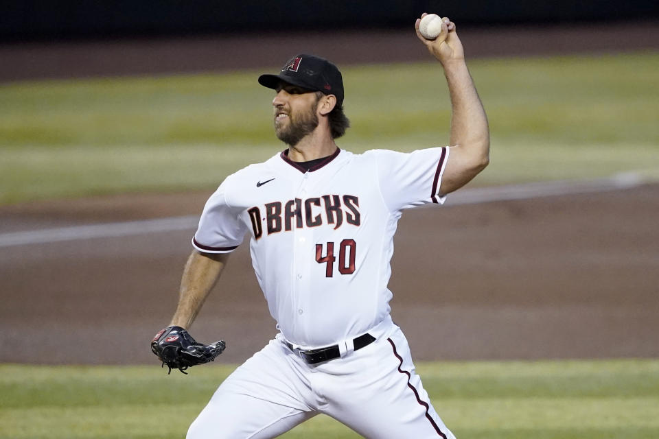 Arizona Diamondbacks starting pitcher Madison Bumgarner (40) throws against the Los Angeles Dodgers during the first inning of a baseball game, Thursday, Sept. 10, 2020, in Phoenix. (AP Photo/Matt York)