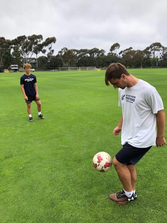 Cooper Lachenbruch, left, a soccer player at the University of California-San Diego, works out with teammate Cory Dailey while contemplating a "new normalcy" in higher education.