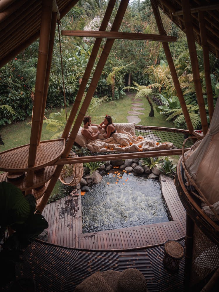 A fun bamboo net hangs over the swimming pool at the Hideout Horizon house in Bali.