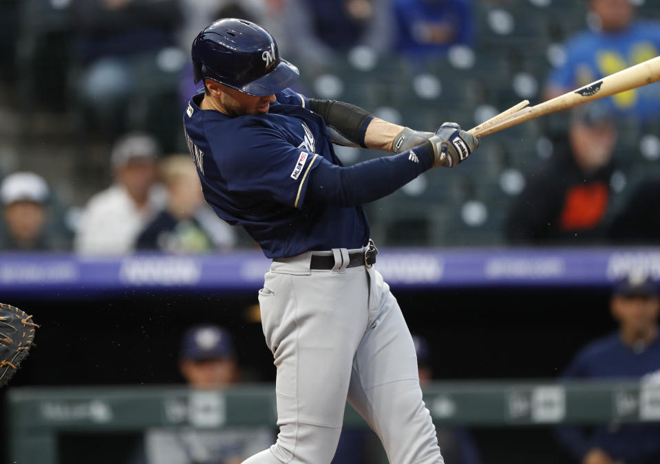 Milwaukee Brewers' Ryan Braun breaks his bat on his RBI-single off Colorado Rockies starting pitcher Antonio Senzatela in the first inning of a baseball game Friday, Sept. 27, 2019, in Denver. (AP Photo/David Zalubowski)