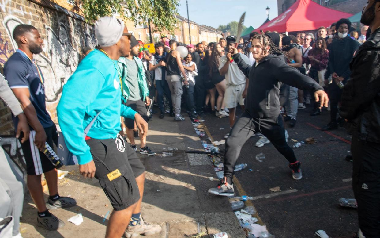 In one clip from a video a youth could be seen running through the streets with a machete