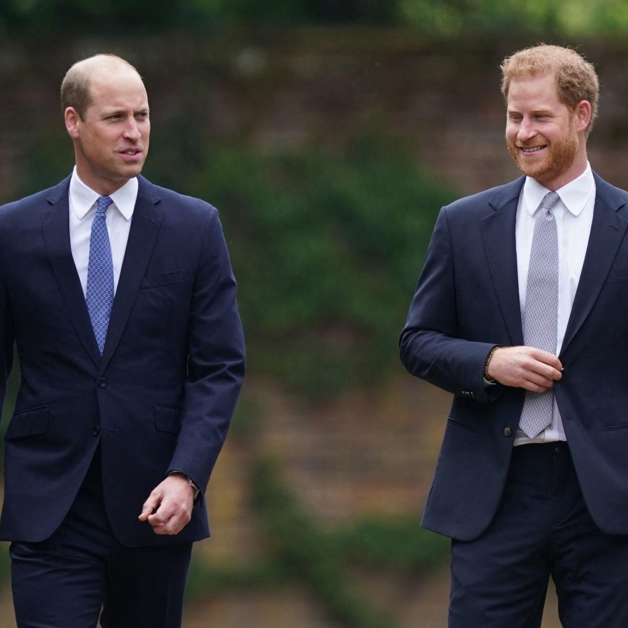  England's Prince Charles flanked by sons Prince William (L) & Prince Harry at National Service of Thanksgiving for Queen Mother's 100th birthday at St. Paul's Cathedral. 