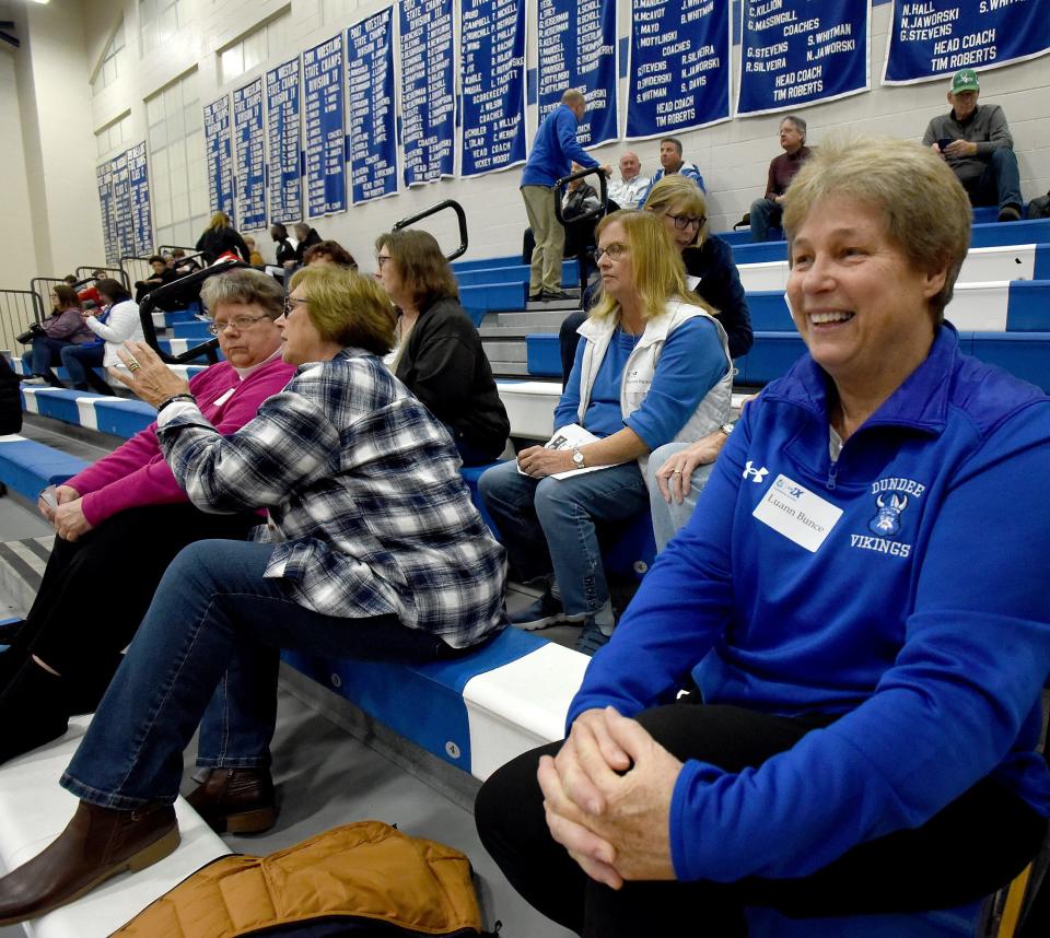 Luan (Bunce) Sedlar has always been a proud Dundee Viking who played basketball and volleyball and ran track in 1972-73 when Title IX was first enacted. Behind is Pat Rigel, Valynda Schuler, Betzy Bronson and Sharon Bunce, who wore name tags with their maiden names.