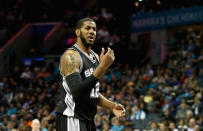 <p>CHARLOTTE, NC - MARCH 21: LaMarcus Aldridge #12 of the San Antonio Spurs reacts after a call during their game against the Charlotte Hornets at Time Warner Cable Arena on March 21, 2016 in Charlotte, North Carolina.NOTE TO USER: User expressly acknowledges and agrees that, by downloading and or using this photograph, User is consenting to the terms and conditions of the Getty Images License Agreement. (Photo by Streeter Lecka/Getty Images)</p>