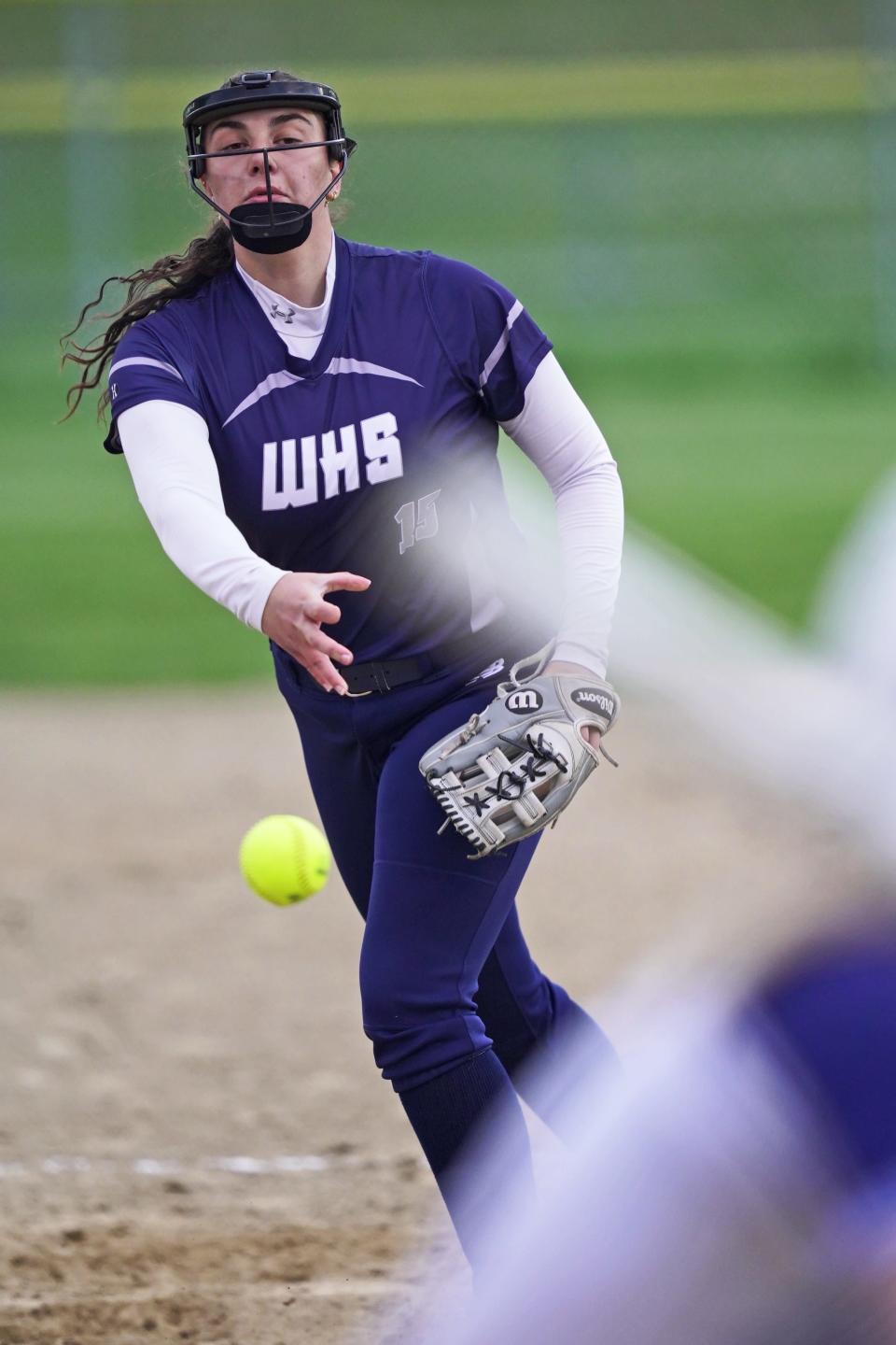 Westerly's Sophia Valentini fires a pitch to a Johnston batter during their game on Monday night.