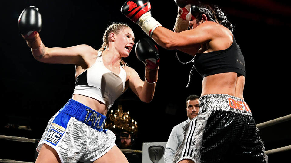 Tayla Harris and Sarah Dwyer in the boxing ring. (Photo by Quinn Rooney/Getty Images)