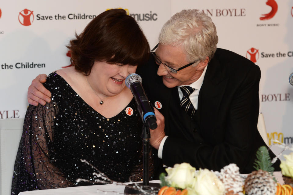 Susan Boyle and Paul O' Grady attend a photocall to announce a charity single for Save The Children at Sony Music on October 28, 2013 in London, England.  (Photo by Dave J Hogan/Getty Images)