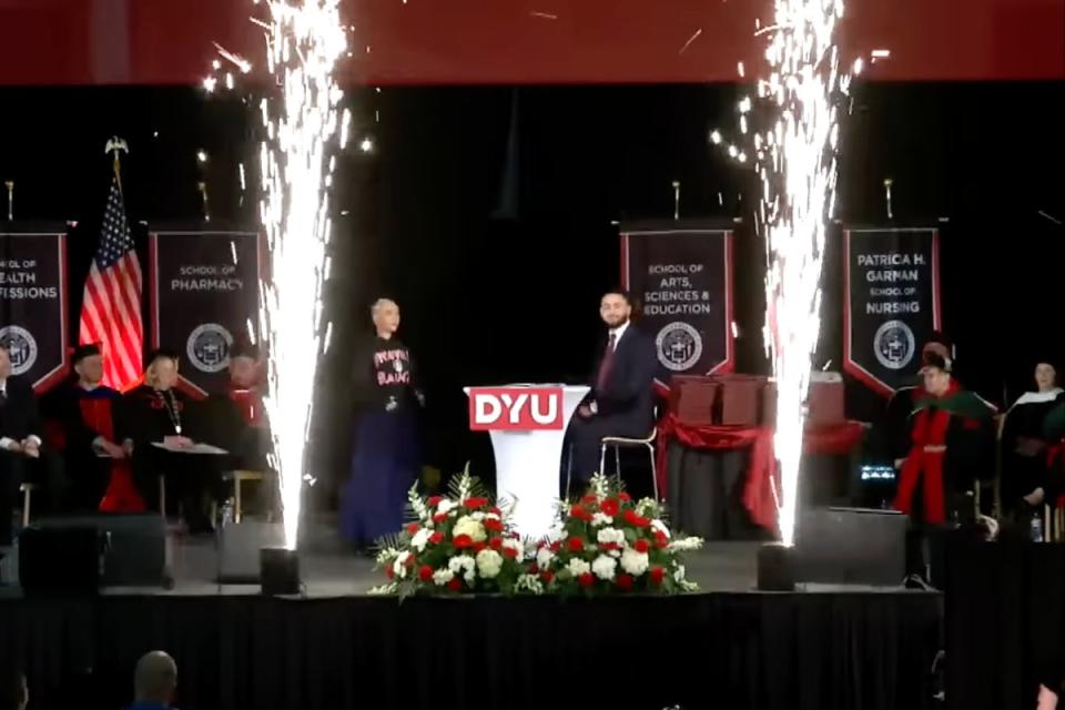 The robot’s entrance was flanked by pyrotechnics and set to electronic band Daft Punk’s 2005 song, Robot Rock (D’Youville University/ YouTube)