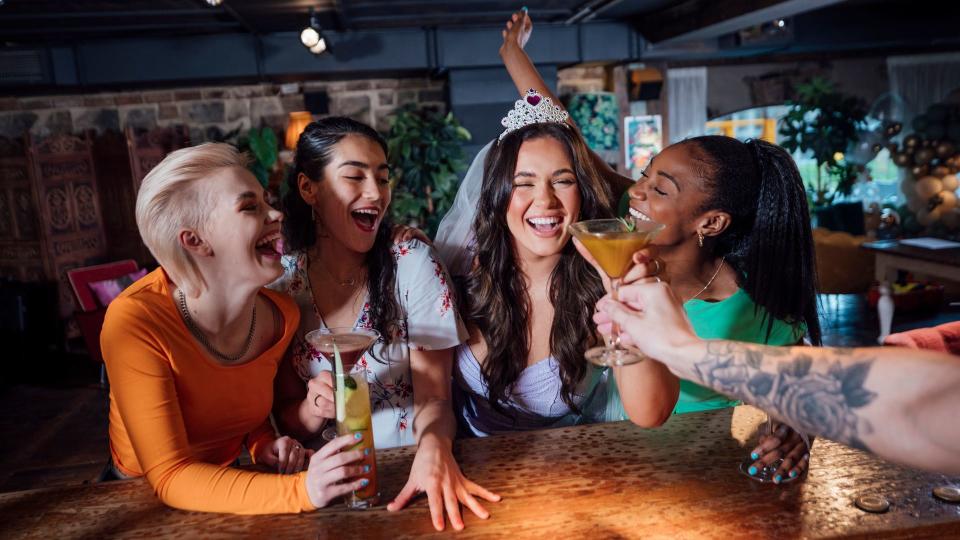 hens laughing at a bar 