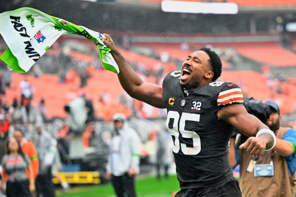 Cleveland Browns defensive end Myles Garrett (95) celebrates after the team's win over the Cincinnati Bengals Sunday in Cleveland.