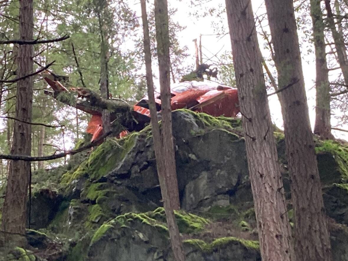 This helicopter crashed on Bowen Island, B.C., on the morning of March 5, 2021. (Irene Paulus - image credit)