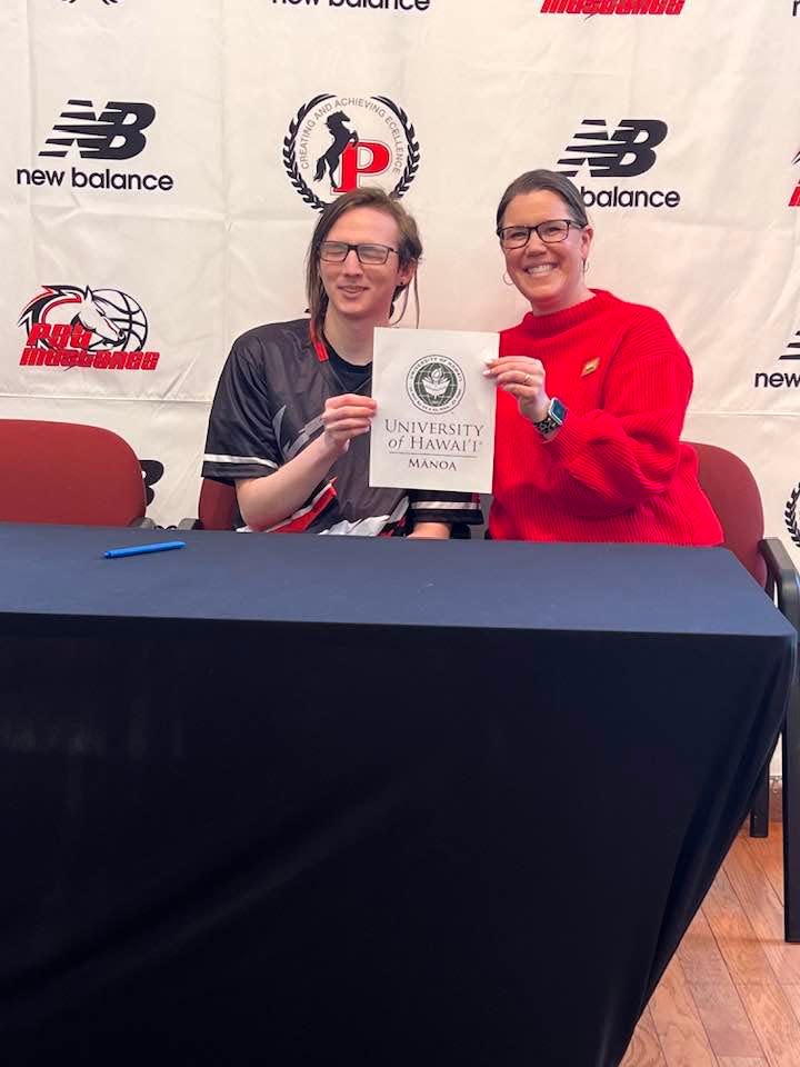 Putnam Science Academy Senior Ben Sulikowski with Head of School Sarah Healey, as he committed to playing esports for University of Hawai'i Manoa.