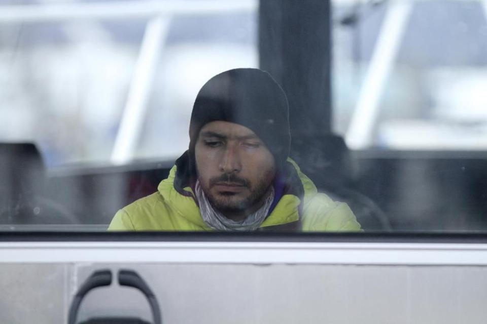 This May 3, 2022, photo shows engineer Ehsan Abdi checking data on his computer after the University of Alaska Fairbanks research vessel Nanuq returned to dock in Seward, Alaska. The data was from a special sensor which Abdi helped fit to an underwater glider to study ocean acidification. (AP Photo/Mark Thiessen)