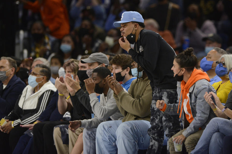 Chance the Rapper watches during the first half of Game 3 of the basketball WNBA Finals between the Chicago Sky and Phoenix Mercury on Friday, Oct. 15, 2021, in Chicago. Chicago won 86-50. (AP Photo/Paul Beaty)