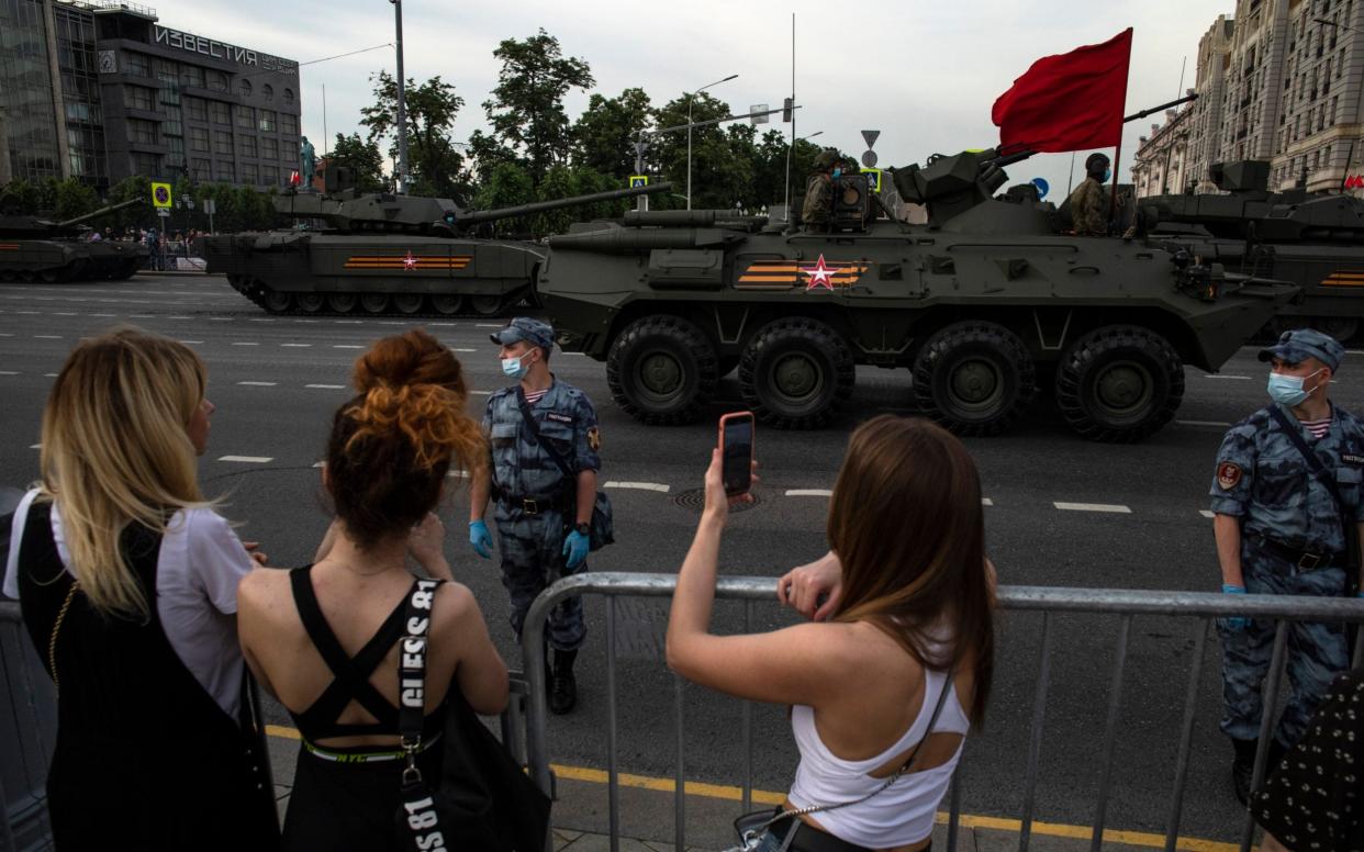 Tanks and other military hardware drove through Moscow on Wednesday for a parade rehearsal - Pavel Golovkin/AP