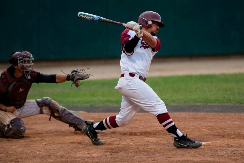 Sierra College shortshop Zach Chamizo puts the ball in play during the fifth inning against Saddleback on Sunday in the California community college state championship tournament at Folsom Lake College. Nathaniel Levine/nlevine@sacbee.com