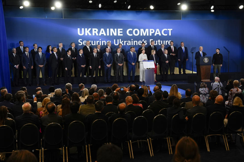 President Joe Biden, right, speaks during an event on the Ukraine Compact at the NATO Summit in Washington, Thursday, July 11, 2024, as Ukraine's President Volodymyr Zelenskyy, far right, and other NATO leaders look on, at the NATO Summit in Washington, Thursday, July 11, 2024. Biden launched the Ukraine Compact, signed by 25 countries and the European Union, as part of a commitment to Ukraine's long term security. (AP Photo/Matt Rourke)