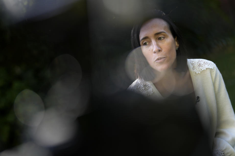 Ophelie Toulliou, sister of a victim of the Rio-Paris plane crash, speaks during an interview with The Associated Press in Sannois, outside Paris, Friday, Oct. 7, 2022. It was the worst plane crash in Air France history, killing people of 33 nationalities and having lasting impact. It led to changes in air safety regulations, how pilots are trained and the use of airspeed sensors. (AP Photo/Christophe Ena)