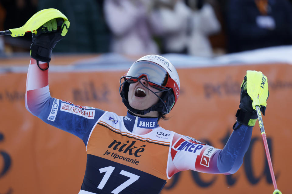 Croatia's Zrinka Ljutic celebrates at the finish area of an alpine ski, women's World Cup slalom race, in Jasna, Slovakia, Sunday, Jan. 21, 2024. (AP Photo/Giovanni Maria Pizzato)