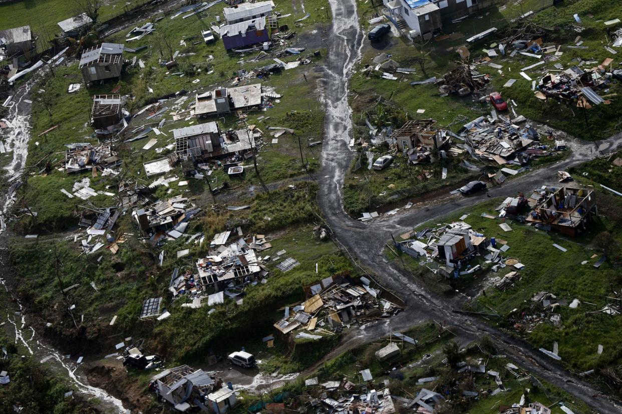 Frustration is mounting about the pace of the response to Hurricane Maria in Puerto Rico, where the destroyed town of Toa Alta is seen on Thursday, Sept. 28, 2017: AP Photo/Gerald Herbert
