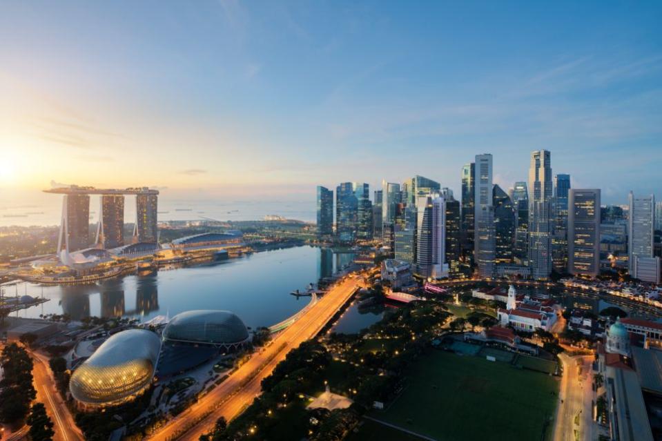 Aerial view of Singapore business district and city at twilight in Singapore, Asia.