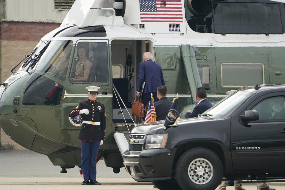 President Joe Biden boards Marine One at Delaware Air National Guard Base in New Castle, Del., Tuesday, Aug. 10, 2021, to fly back to the White House after spending the weekend at his house in Wilmington, Del. (AP Photo/Manuel Balce Ceneta)