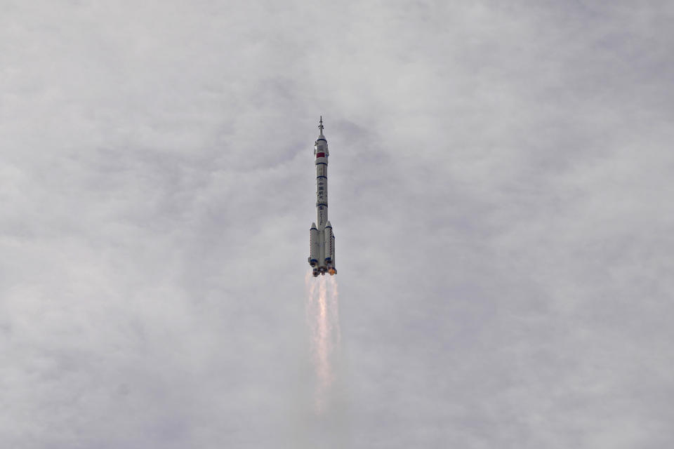 A Long March rocket carrying a crew of Chinese astronauts in a Shenzhou-16 spaceship lifts off from the Jiuquan Satellite Launch Center in northwestern China, Tuesday, May 30, 2023. (AP Photo/Mark Schiefelbein)