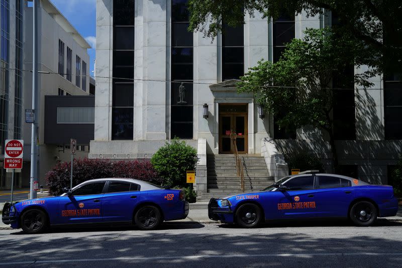 Georgia State Patrol vehicles are seen outside the Georgia State Capitol building in Atlanta